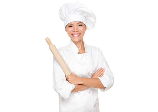 Baker / Chef woman happy holding baking rolling pin wearing uniform isolated cutout PNG on transparent background. Asian Caucasian female model with arms crossed standing proud and confident.