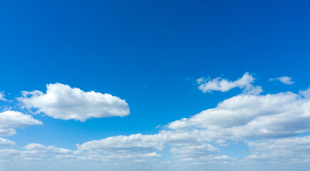 Blue sky with white clouds.