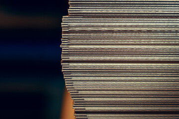 Sheets of metal in a stack in a warehouse