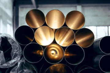 Foto op Plexiglas Stainless steel pipes in an industrial warehouse © thomsond