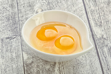 Chicken egg in the bowl