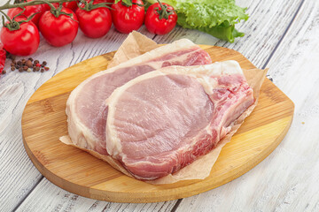 Raw pork t-bone steak for grill