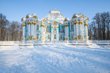 The ancient Hermitage pavilion in the winter landscape on a sunny February day. Alexander Park of...