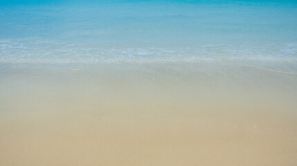Abstract sand of beach and soft ocean wave background