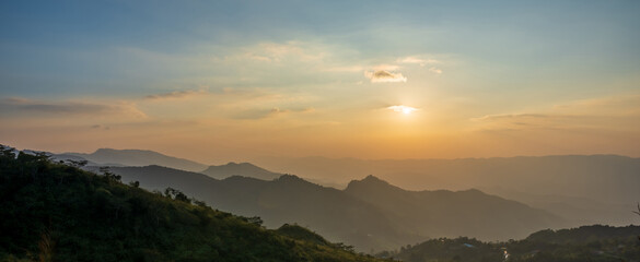 Naklejka premium Scenic view of Mountains against sky during sunset. Countryside landscape view background.