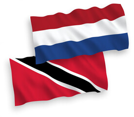 Flags of Republic of Trinidad and Tobago and Netherlands on a white background