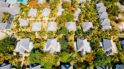 This stunning toned aerial view captures the beauty of Kiwengwa beach in Zanzibar, Tanzania. The luxurious resort and the turquoise ocean water create a picture-perfect scene.