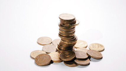 stack of gold coins on a white background