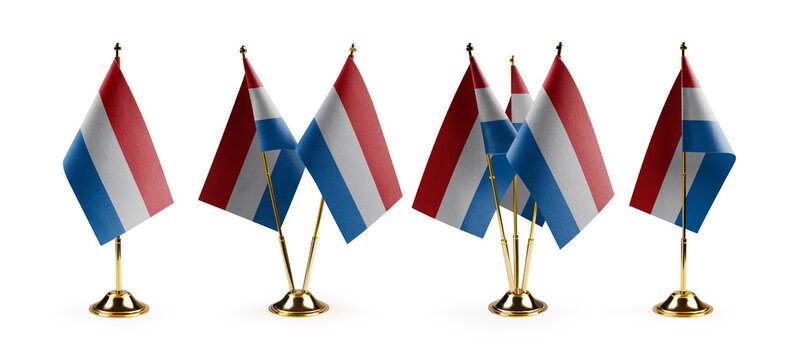 Small national flags of the Netherlands on a white background