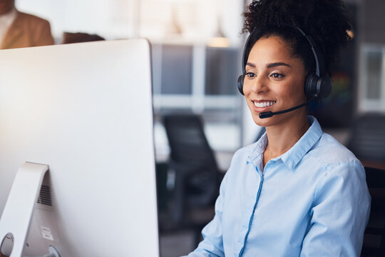 Call center, customer service and computer with a black woman consultant working in her communication office. Contact us, telemarketing and consulting with a female employee at work using a headset