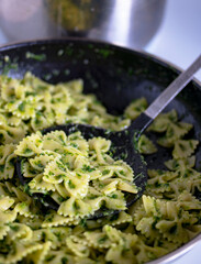Pasta with pesto.Cooking process step by step in the kitchen.