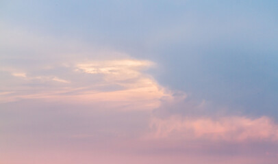 The vast Beautiful sky and four orange clouds that are beautiful sky before sunset. The natural sky before background has a breeze on a bright day in the summer.
