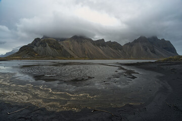 Fantastic Rainy day black sand beach on Stokksnes cape in Iceland VestrahornStokksnes Iceland 2022
