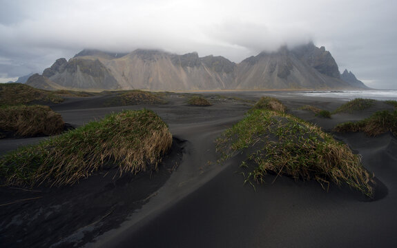 Fantastic Rainy day black sand beach on Stokksnes cape in Iceland VestrahornStokksnes Iceland 2022