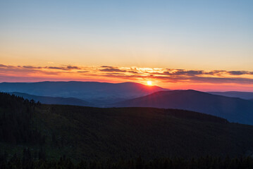 Sunset from Dlouhe strane hill in Jeseniky mountains in Czech republic