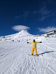 Fototapeta na wymiar Snowboarder on top of Mt Hood