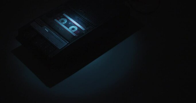 Analog Cassette Recorder Under Blue Spotlight