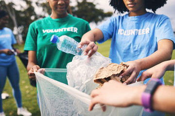Recycle, plastic bag and ngo volunteer group cleaning outdoor park for sustainability. Nonprofit, recycling project and waste clean up in nature for earth day, climate change and community support - obrazy, fototapety, plakaty