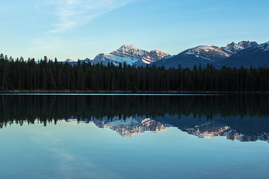 Canadian Rockies reflecting in Annette Lake, Jasper National Park, Alberta, Canada
