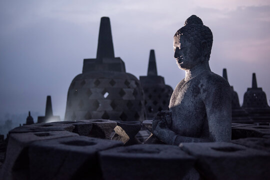 Buddha statue at the Borobudor temple in Java, Indonesia.