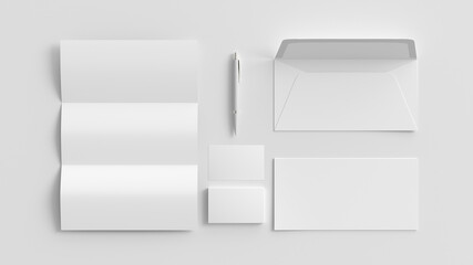 Blank corporate stationery set mockup on white background.  View directly above