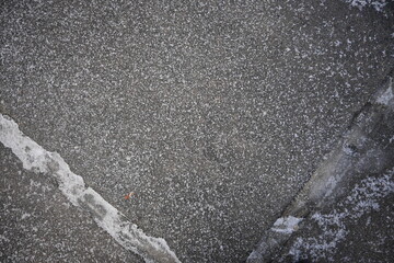 asphalt soviet square concrete tile, asphalt tile covered with thin ice crust, icy ice tile,...