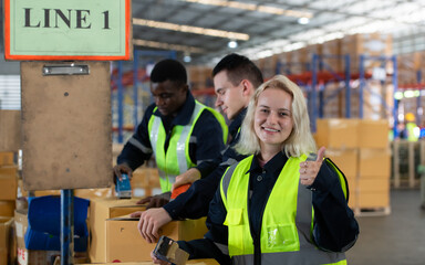 Portrait of worker in an auto parts warehouse, Relax after examine auto parts that are ready to be shipped to the automobile assembly factory.