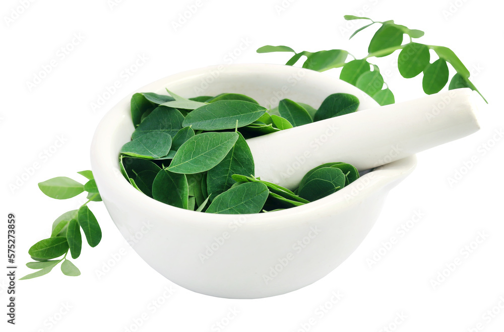 Sticker edible moringa leaves in a mortar with pestle