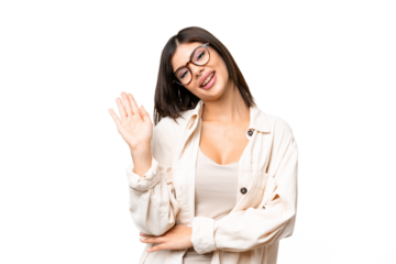Young Russian woman over isolated chroma key background saluting with hand with happy expression