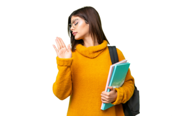 Young student woman over isolated chroma key background making stop gesture and disappointed