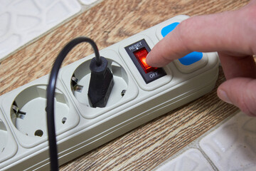 turn off to the extension cord,saving electricity, the stick presses the button on the electric...