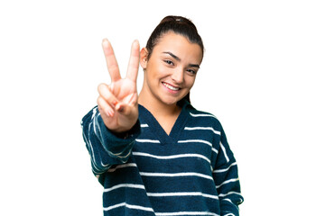 Young beauty woman over isolated chroma key background smiling and showing victory sign