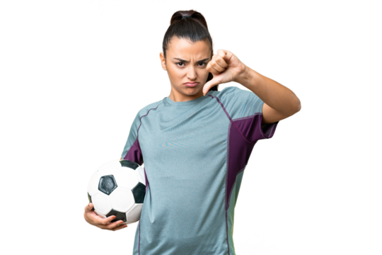 Young football player Woman over isolated chroma key background showing thumb down with negative expression