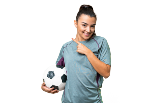 Young football player Woman over isolated chroma key background pointing to the side to present a product - Powered by Adobe