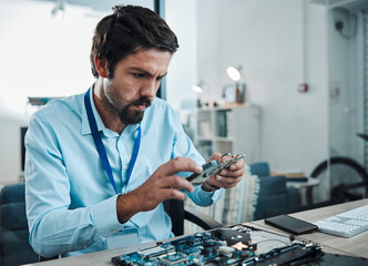 Man, circuit and hard drive in repair workshop for maintenance, computer tech or industry with...