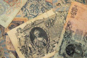 Naklejka premium Background of Money of tsarist Russia. 100, 25, 5, 3 Rubles Banknote From Russian Empire, Rare Paper Money From 19th Century. Ruble Paper Banknote From Imperial Russia