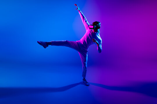 gamer in virtual game with vr glasses is in simulated battle while fight against imaginary opponents and be in a interactive and futuristic world feel a thrill and being filled with adrenaline