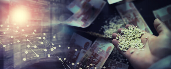 The concept of the cost of grain. 5000 ruble banknotes around a handful of ground grain. World...