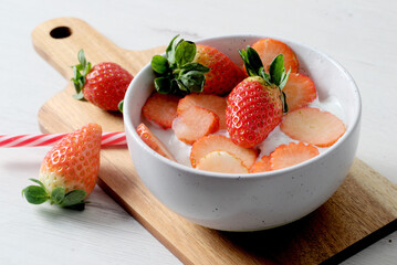 White bowl with strawberries