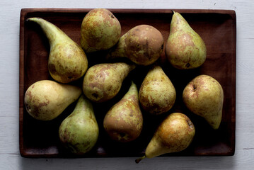 Wooden tray with pears