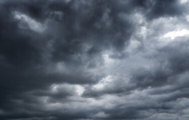 dark clouds make sky in black. Heavy rain thunderstorm. Pattern of clouds overcast predict tornado, Hurricane or thunderstorm and rainy. Dark sky cloudy have storm and lightning thunderbolt.
