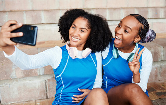 Netball selfie, sports women or team on break with social media post, happy training update and relax on floor. Athlete black people, teenager or gen z friends in profile picture and peace emoji hand