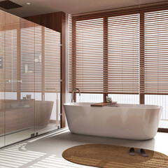Modern wooden bathroom in white and beige tones. Freestanding bathtub and shower with glass door...