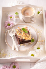 Beautiful yeast cake with icing and fruits..