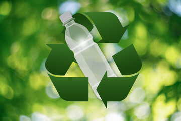 Plastic bottle with recycle symbol on a green background
