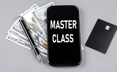 Credit card and text MASTER CLASS on smartphone with dollars and pen. Business concept