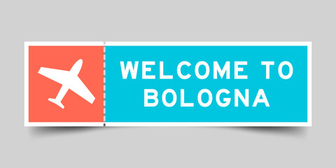 Orange and blue color ticket with plane icon and word welcome to bologna on gray background © bankrx