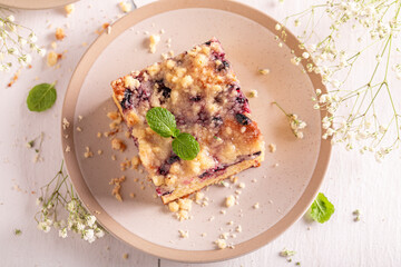 Beautiful yeast cake made of fruits and icing..