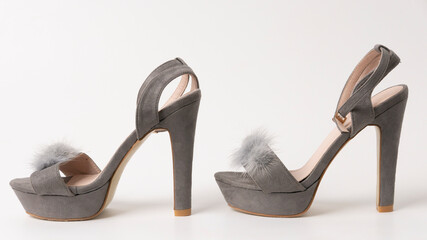 women's high-heeled shoes with fur isolated on a white