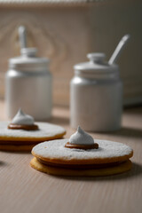 close up of fresh cookies with Bizet on table